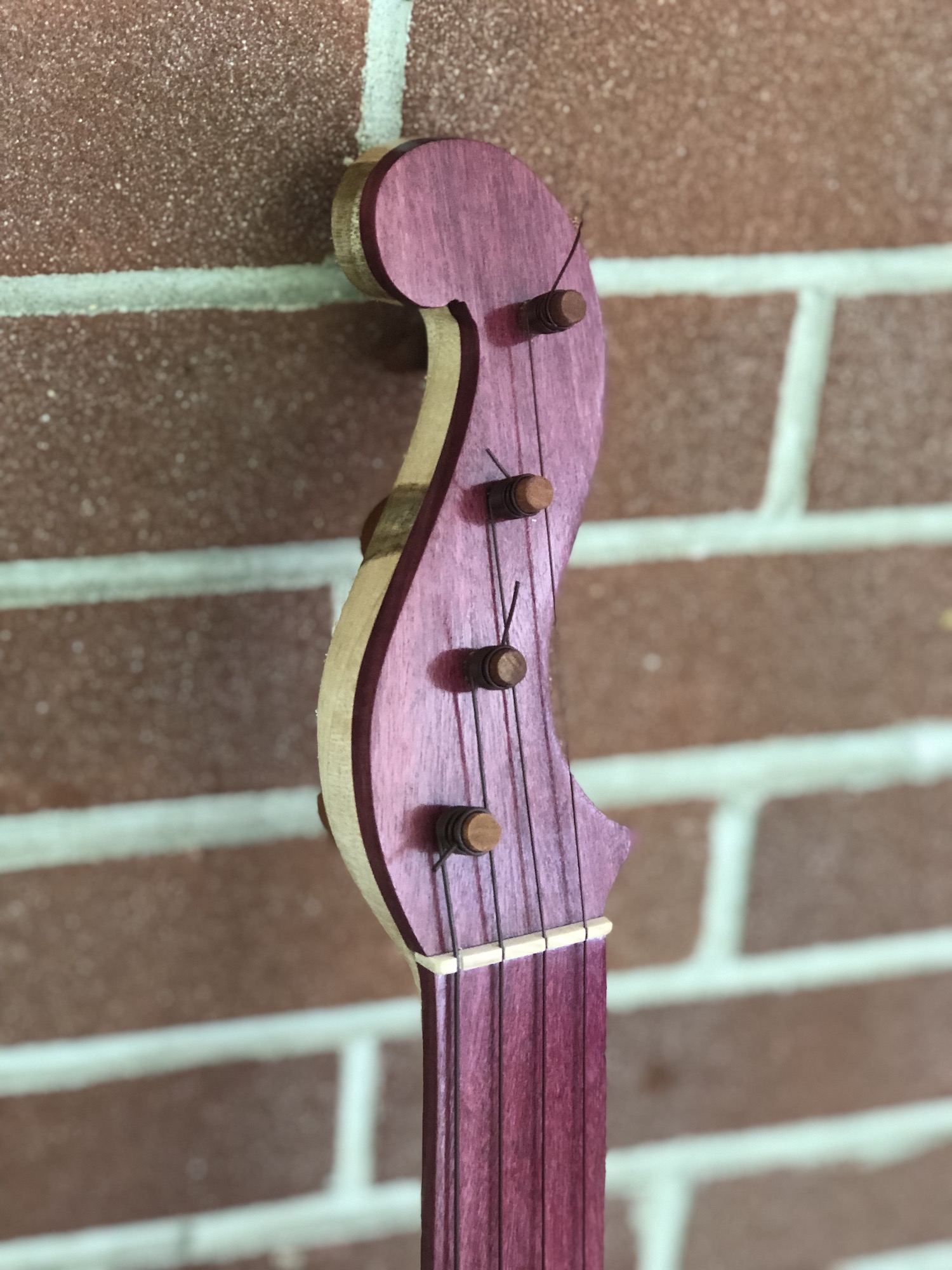 Maple and purpleheart peghead