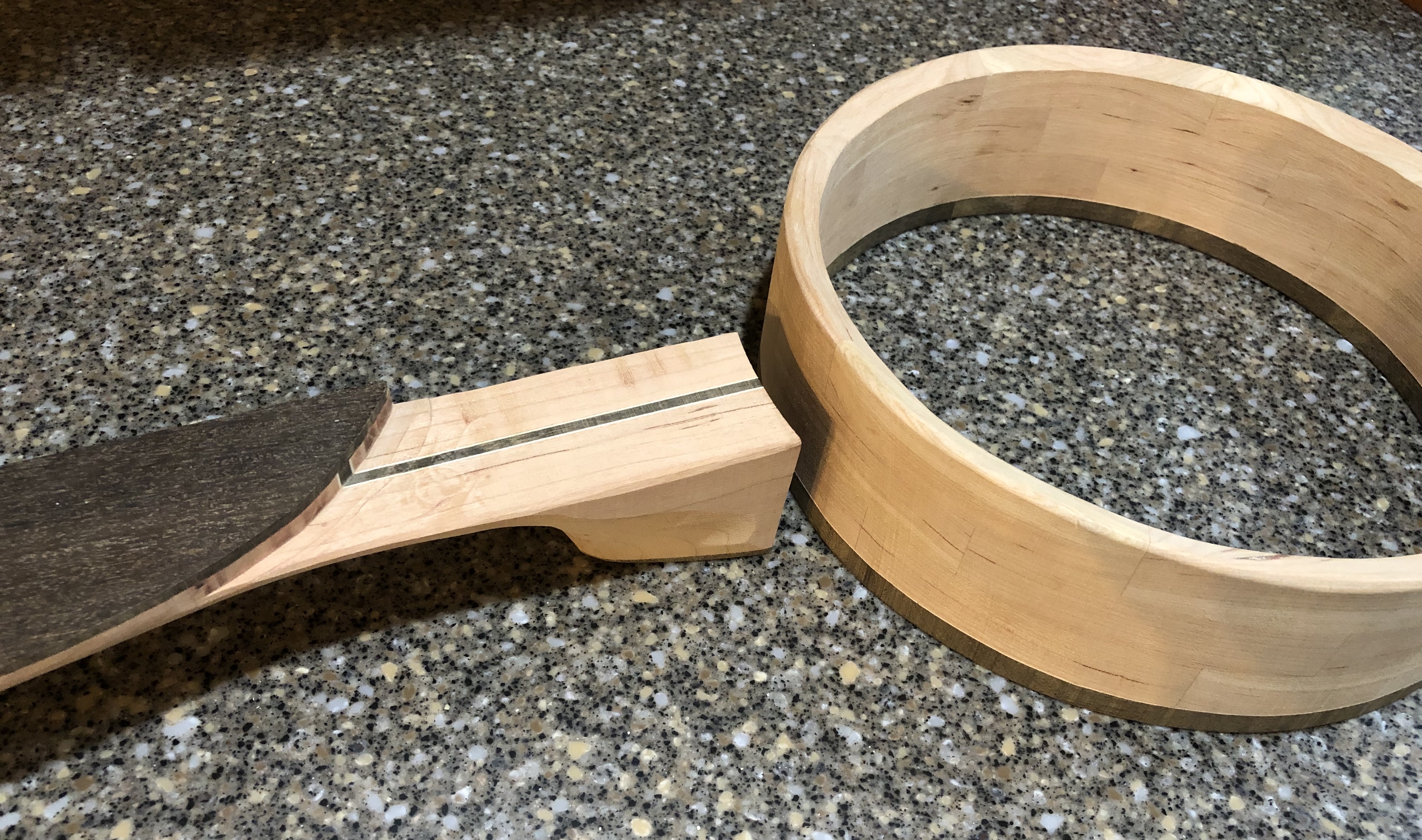 Carving the neck to fit the rim